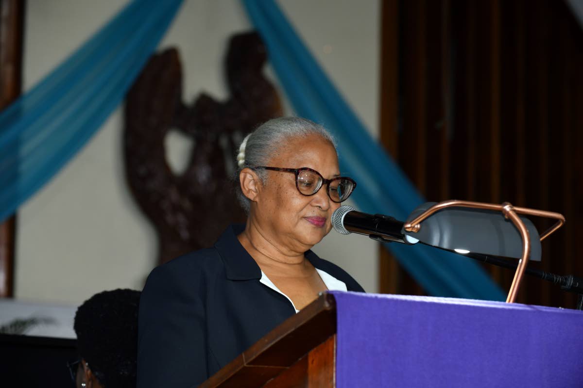 Mayberry Foundation CEO Kayree Berry Teape delivers the eulogy during the funeral for Doris ‘May’ Berry, founding director of Mayberry Investments Limited at the Webster Memorial United Church on Monday. 