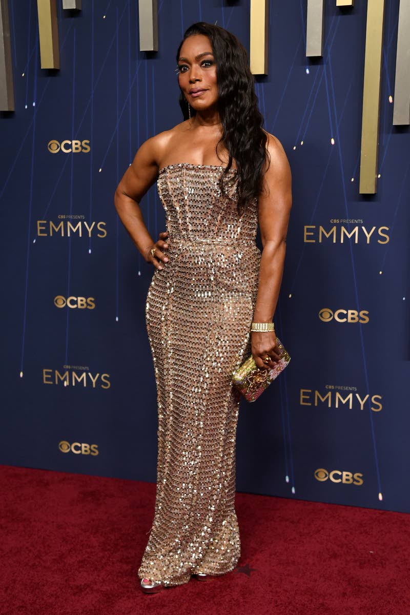 Angela Bassett in Yara Shoemaker and Lagos jewellery, paired with a Judith Leiber clutch. 