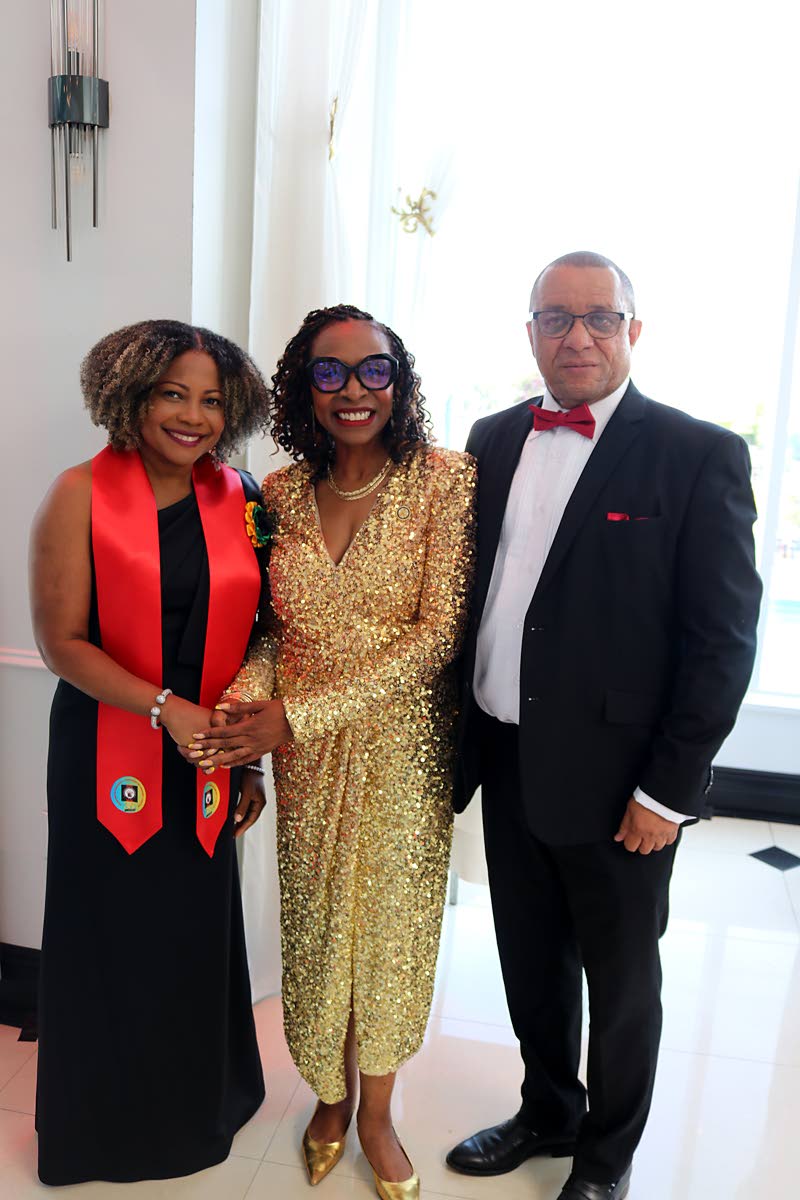 Minister of Education, Skills, Youth and Information, Dr Dana Morris Dixon receives a warm welcome from United States Congress Woman Yvette Clarke at UJAA’s 35th anniversary luncheon and awards gala on September 14. At right is the president of the Union