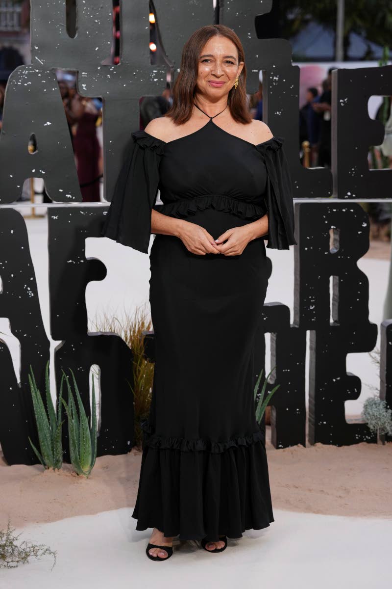 Maya Rudolph keeps it effortless in a black off-the-shoulder maxi dress.