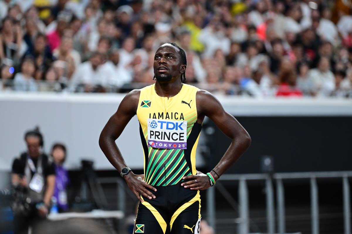 Demario Prince looks up at the monitor ahead of finding out he missed the World Athletics Championships 110-metre final by the slimmest of margins yesterday. 