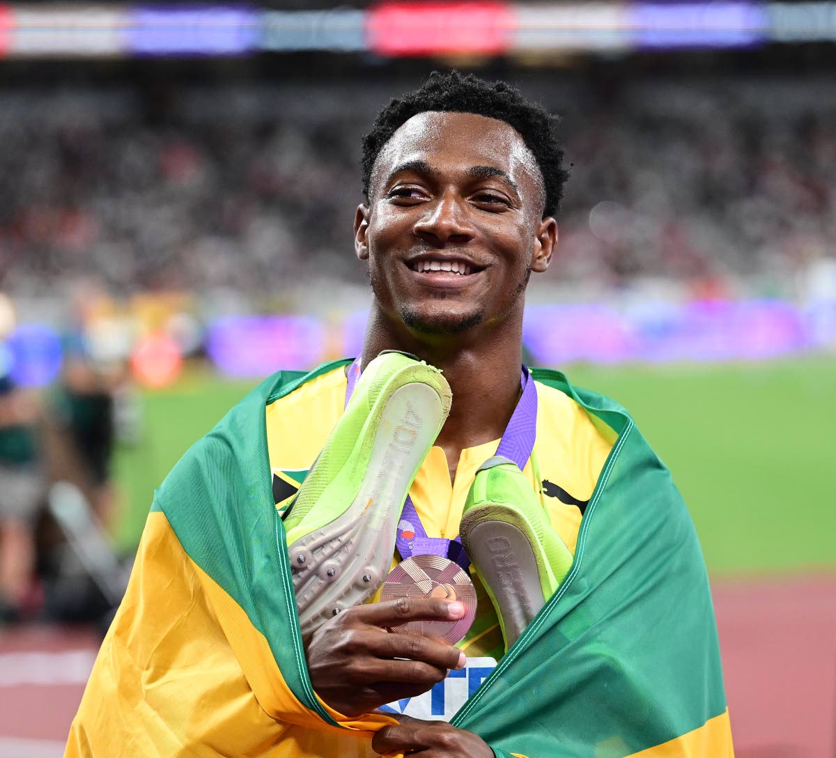 Bryan Levell of Jamaica celebrates bronze in the men’s 200m finals at the World Athletics Championships Tokyo 2025 held at the Japan National Stadium in Tokyo, Japan, yesterday Levell took the bronze in a time of 19.64, a personal best. 