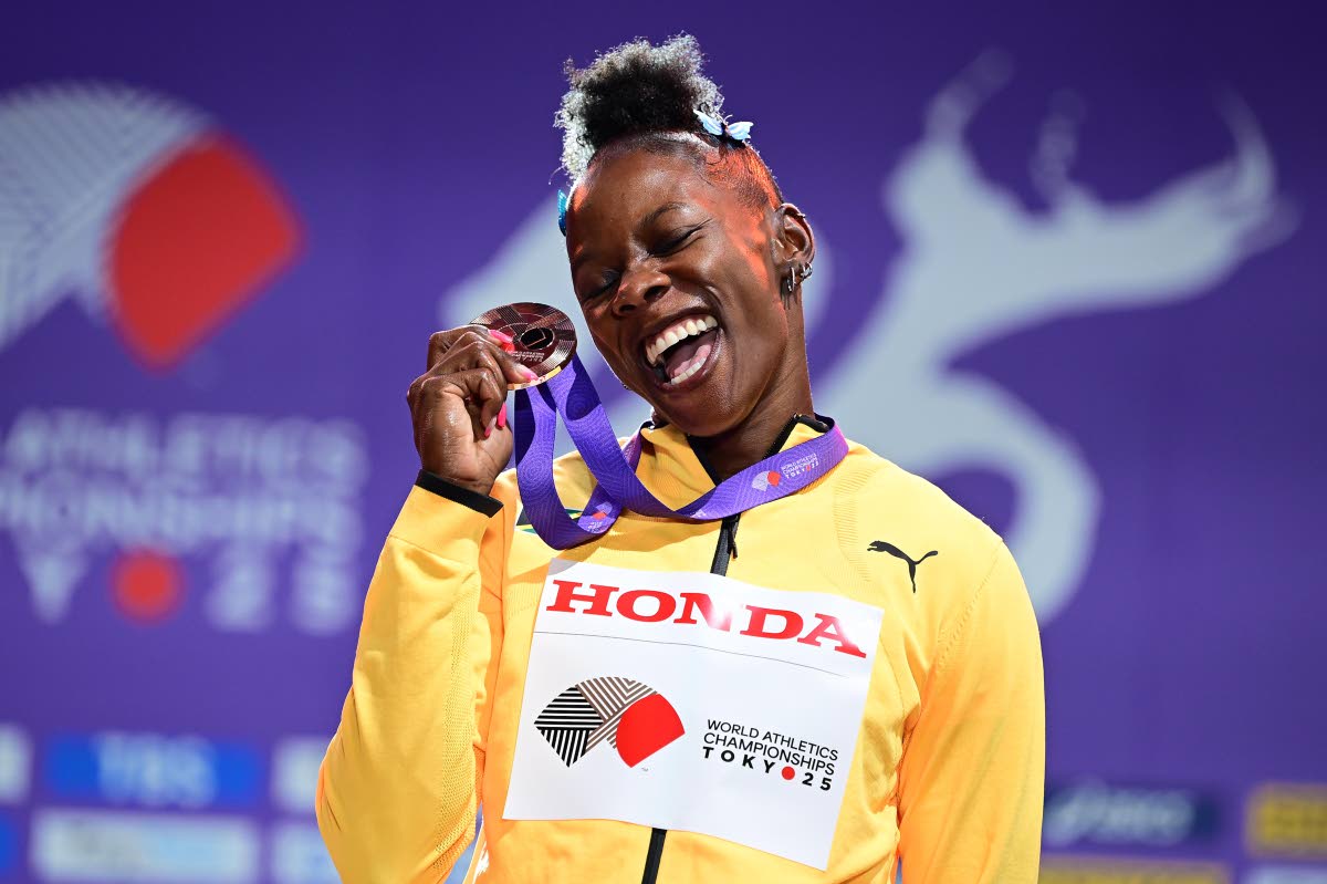 Shericka Jackson on the podium for bronze in the women’s 200m