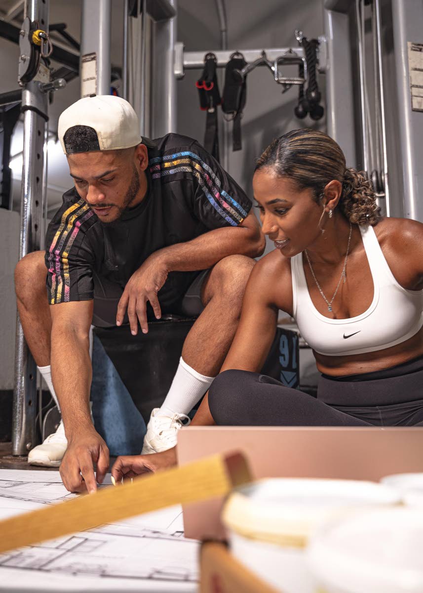 Contributed photos
Kandi King and her cousin, Jamaican cricketer Brandon King, look over renovation plans for KYM ahead of the renovations set to begin this month. 