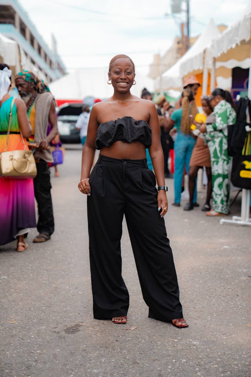 Sudan Peters adds a playful vibe to her outfit with this ruffled crop top.