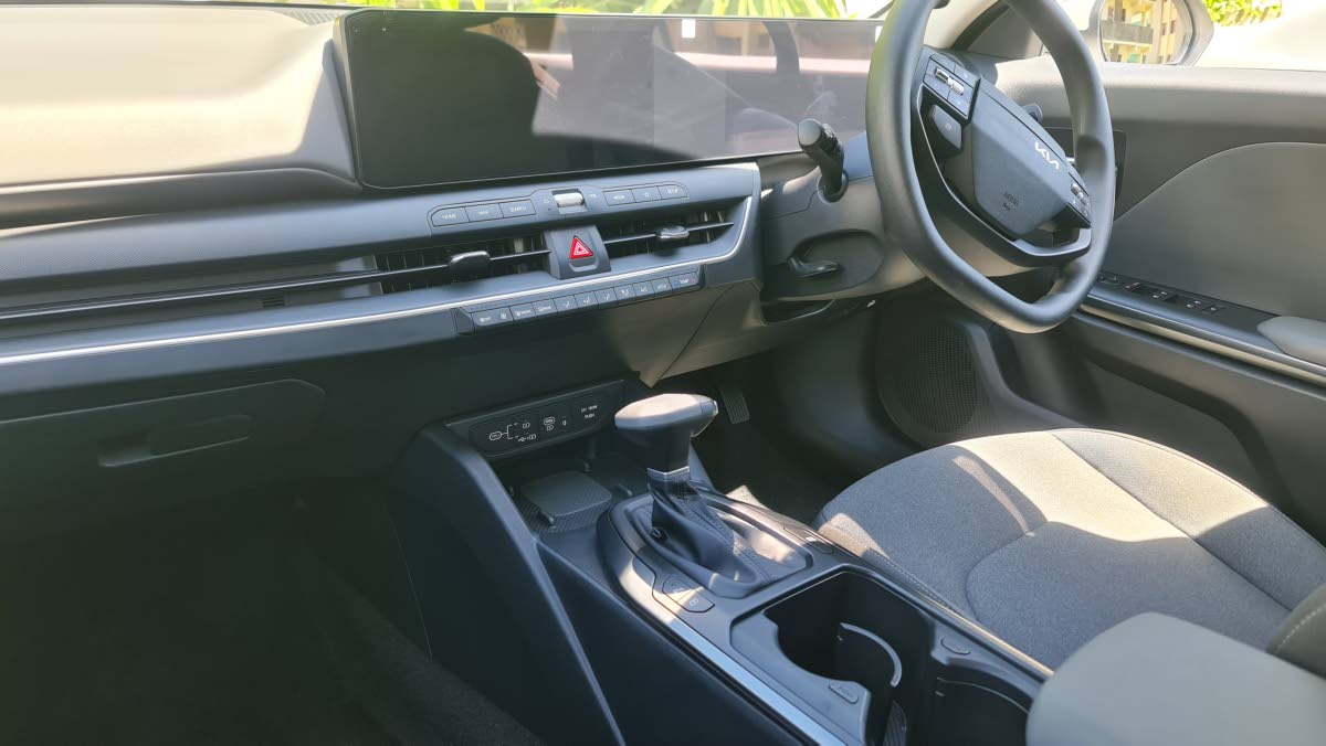 Minimalism meets technology in the cockpit, where the near 30-inch panoramic display integrates the instrument cluster and infotainment, balanced by dedicated physical controls for climate comfort.