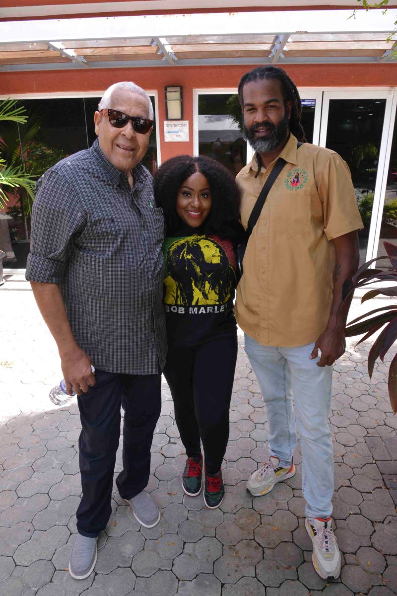 From left: King Jammy, Etana and Baby G share a moment after the Teenage Engineering presentation at Alpha Boys’ School on Monday.