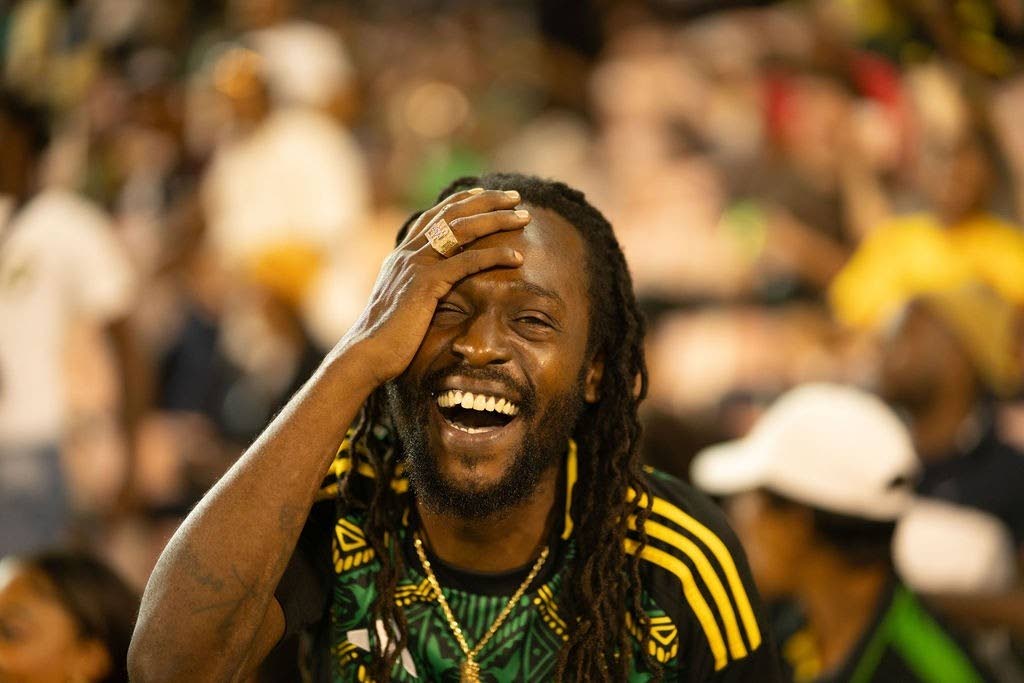 An elated Jesse Royal celebrates another goal by Jamaica’s Reggae Boyz over Bermuda. 