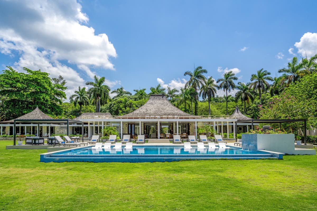 A striking waterfront estate designed as a series of connected gazebo pavilions.