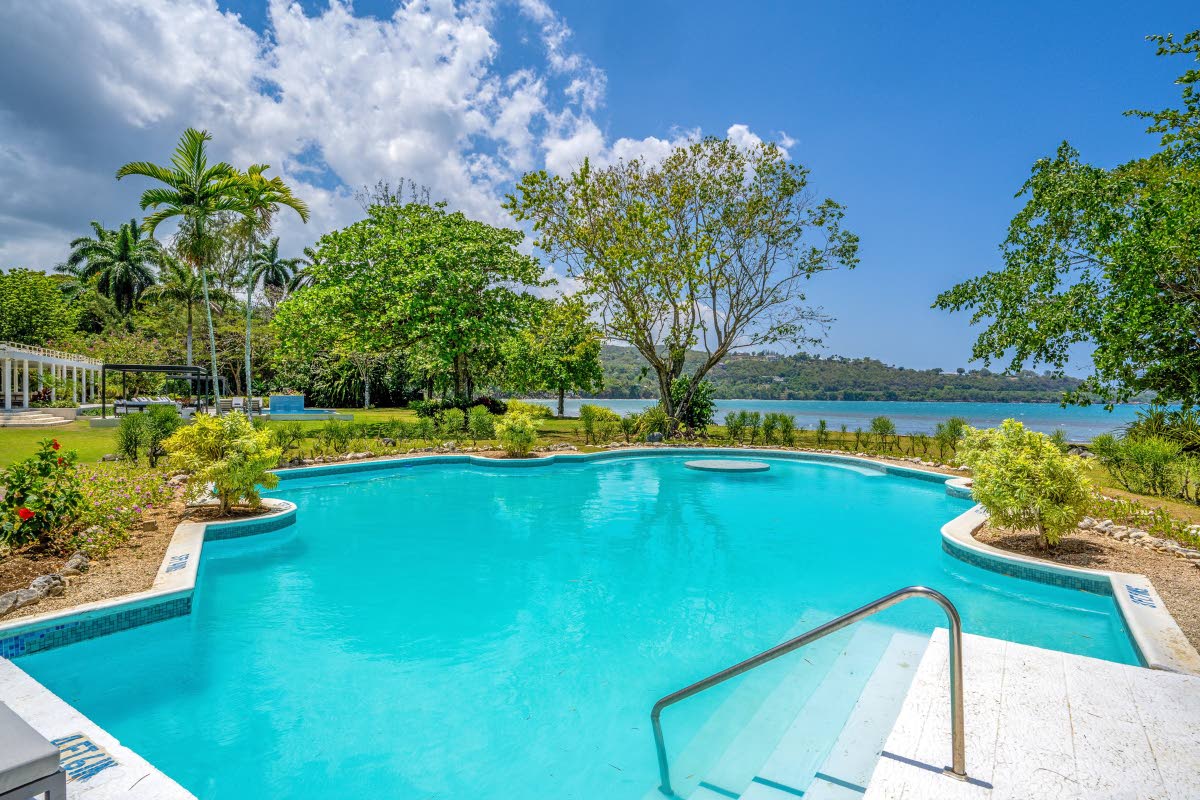 A vast, sculptural seafront pool.