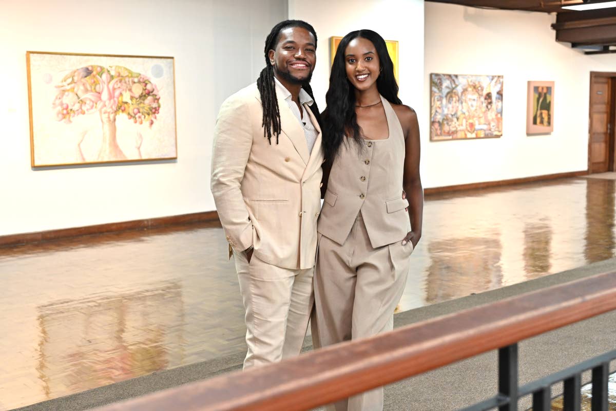 After immersing in the iconic artwork in The Kapo and the Edna Manley Galleries, Asfaw and her emergency room physician husband Kurtious Loney-Walsh embrace on their afternoon outing at the National Gallery of Jamaica.