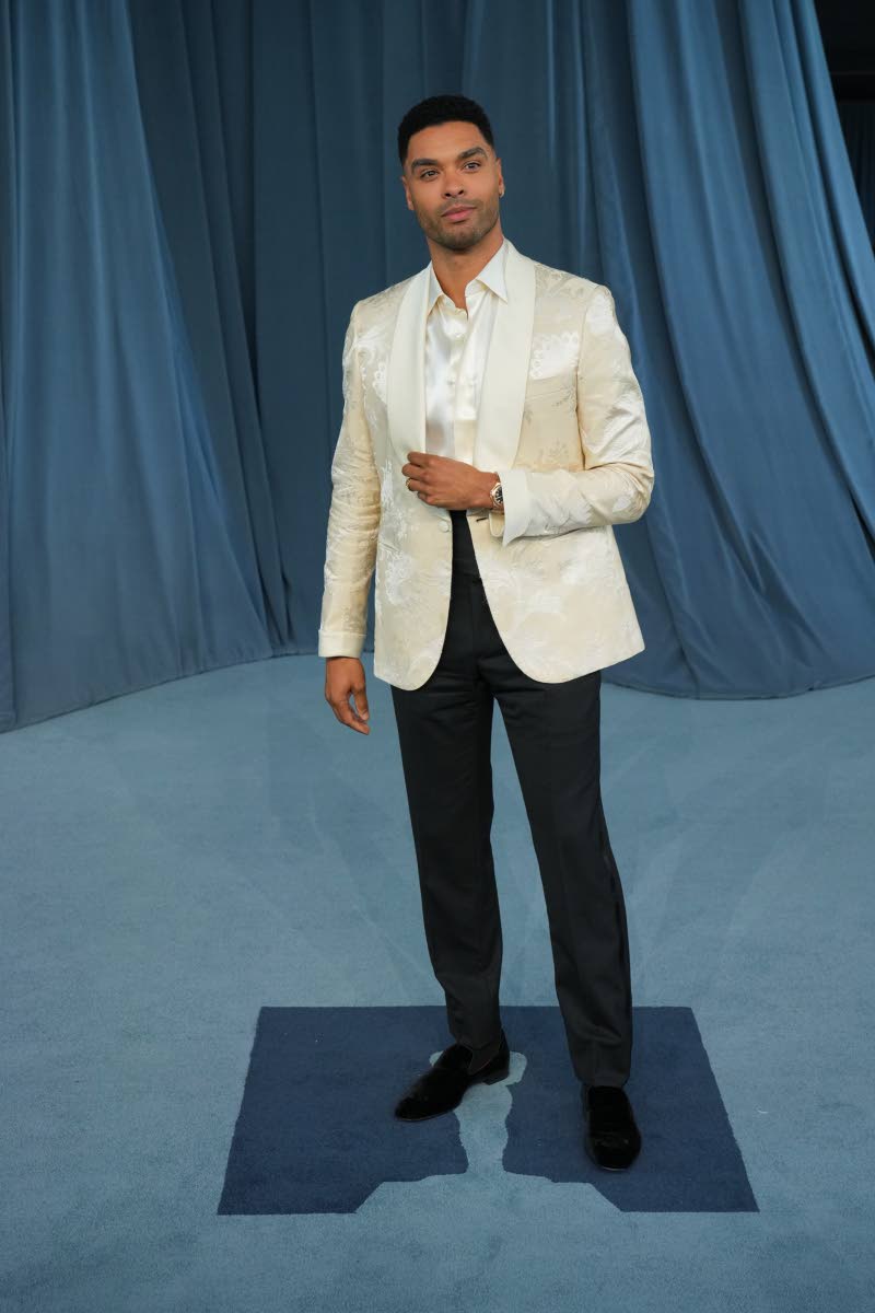 Regé-Jean Page suits up in Brioni. 