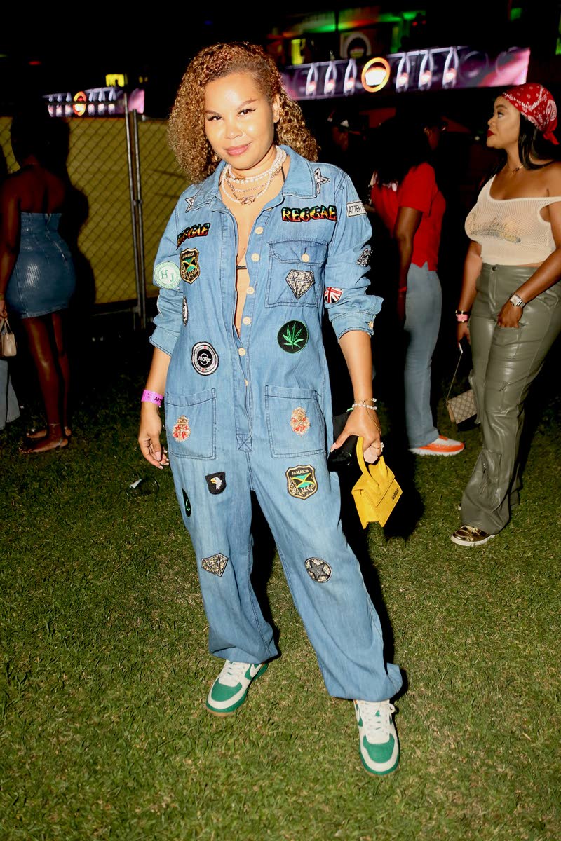 Ce’Cile’s denim jumpsuit, paired with Nike low tops and a yellow Jacquemus mini bag, has maximum utility. With Jamaican and reggae-inspired patches, it gives peak festival style and definite comfort.