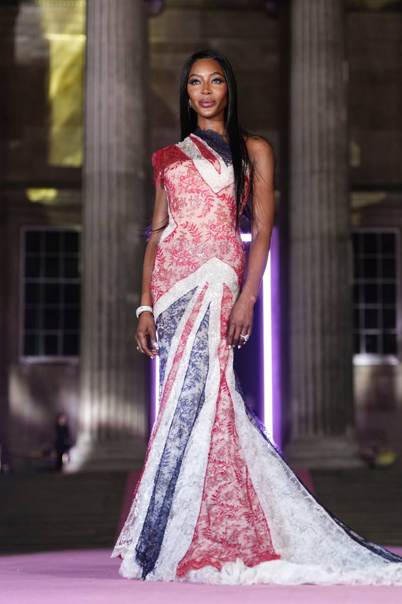 Naomi Campbell made a statement at the inaugural event in a vintage Givenchy Haute Couture featuring the United Kingdom’s Union Jack flag pattern.