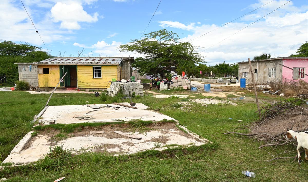 A section of a yard in Parottee, St Elizabeth, belonging to residents who have been still struggling to rebuild after last year’s onslaught from Hurricane Beryl.