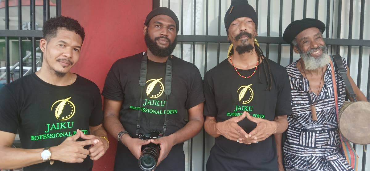 From left: JAIKU poets Britton Wright, The Prophet, Mighty Ginsu, and musician M’Bala waiting to perform at Kingston Creative’s Artwalk on Sunday, September 28, in downtown Kingston.