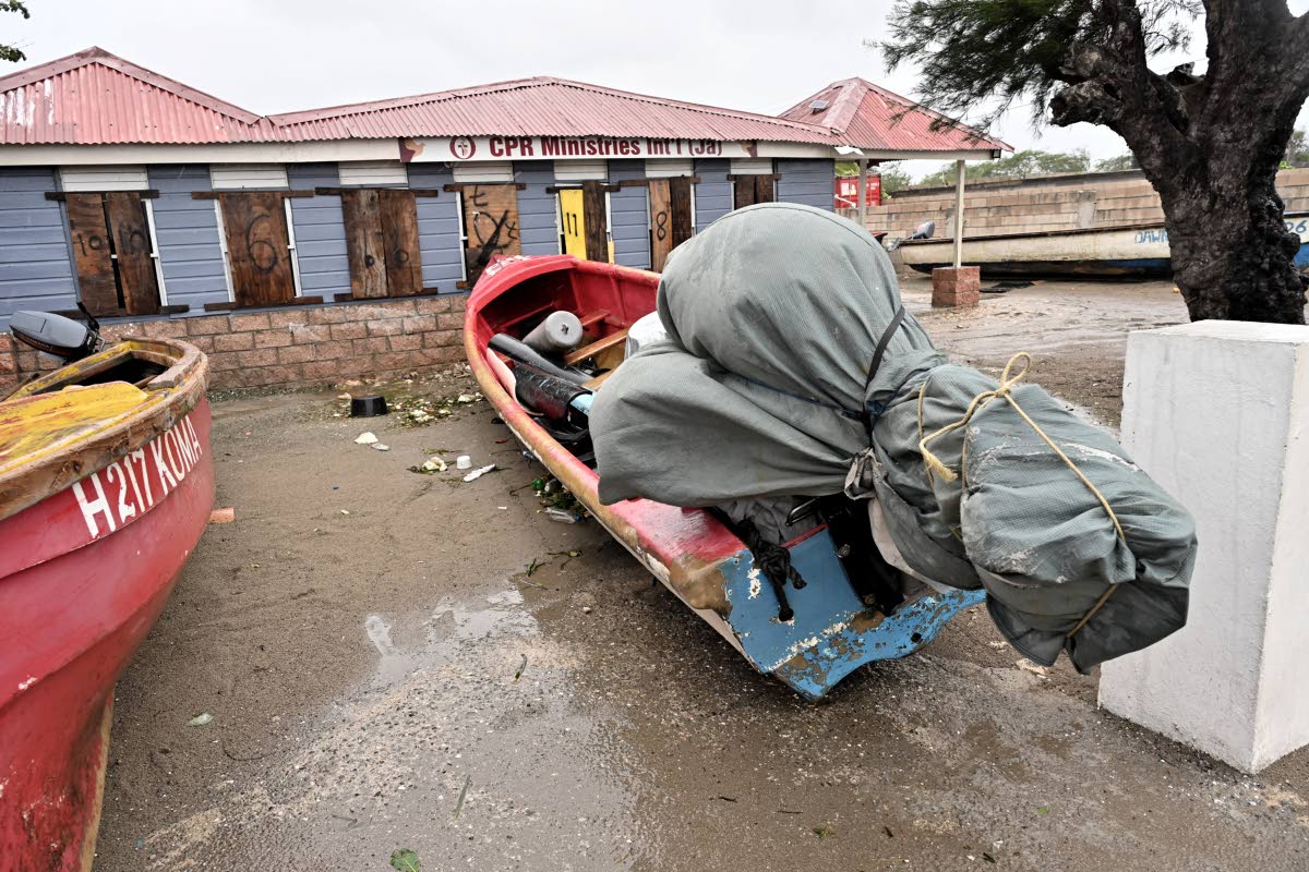 Along the usually busy Portmore fishing village near the old Forum Hotel, the beachfront was deserted as most fishermen packed up and left ahead of worsening weather on Monday.