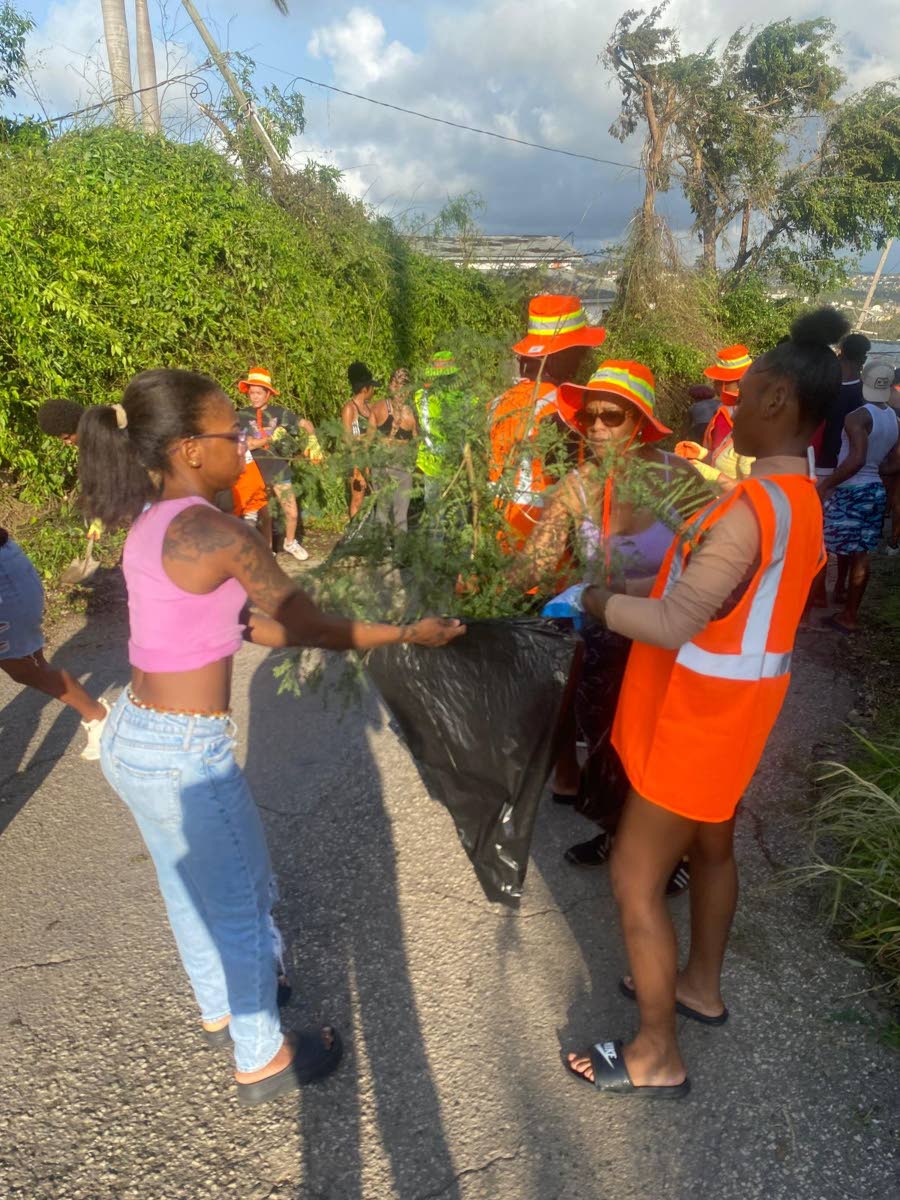 Employees of Hah-R-Mony Entertainment Limited assist with post-Hurricane Melissa cleanup efforts in Montego Bay, St James.