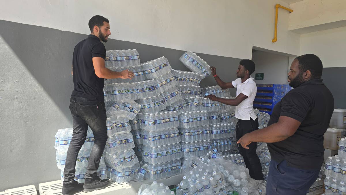 The RIU team preparing water to be dispatched with food organised in collaboration with World Central Kitchen.