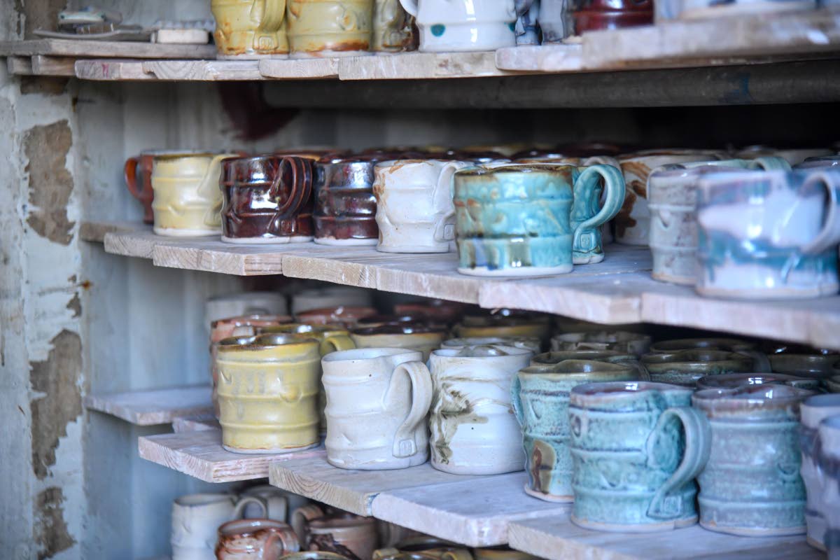Signature Pinto Pottery mugs are part of the inventory Pinto has stored.