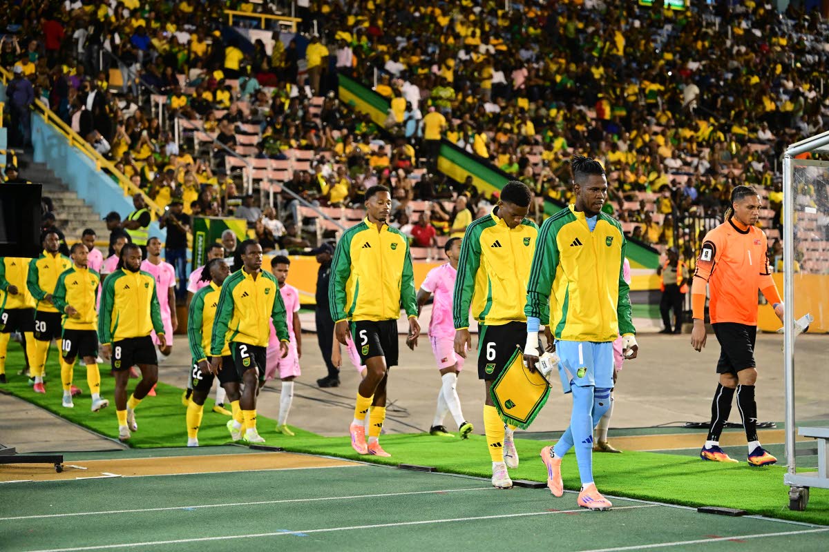 
Jamaica’s Reggae Boyz walk out at the National Stadium in Kingston for a Concacaf World Cup Qualifier against Bermuda on October 14.