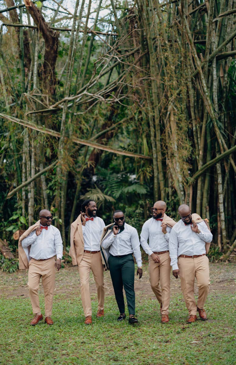 The dapper groom walks into this new love chapter alongside his groomsmen (from left) Shawn Henriques, Chadrick Ashley, Dwayne Harris and Tyrone Thompson.