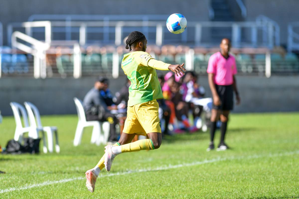 Treasure Beach’s Jhanni Flemmings jumps to get a ball under control during a Jamaica Premier League game against Cavalier Soccier Club at Sabina Park on Septeember 21.