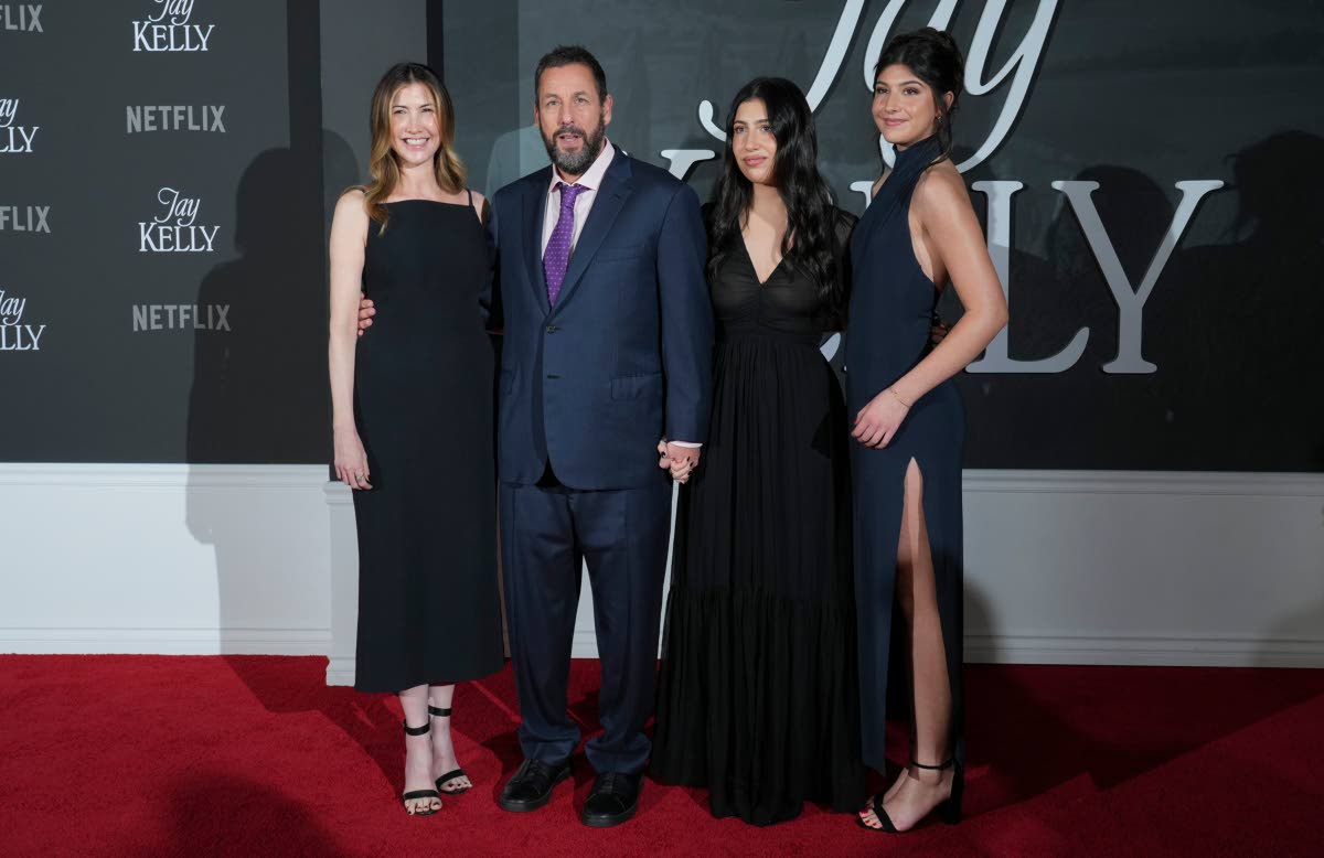  Adam Sandler (second left) and family (from left), wife Jackie Sandler and daughters Sadie Sandler and Sunny Sandler. 