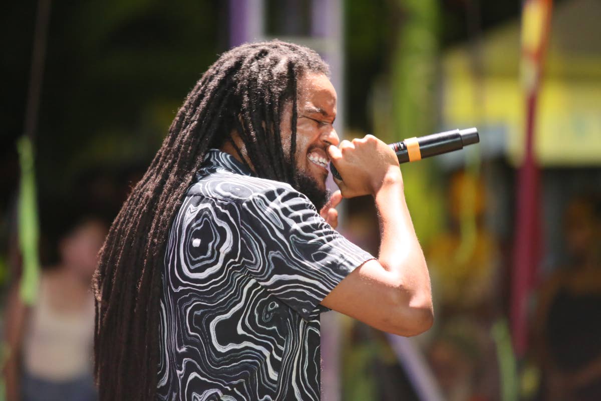 Ras-I interacts with the audience during his high energy performance at the 2023 Calabash International Literary Festival held at Jakes in Treasure Beach, St Elizabeth.