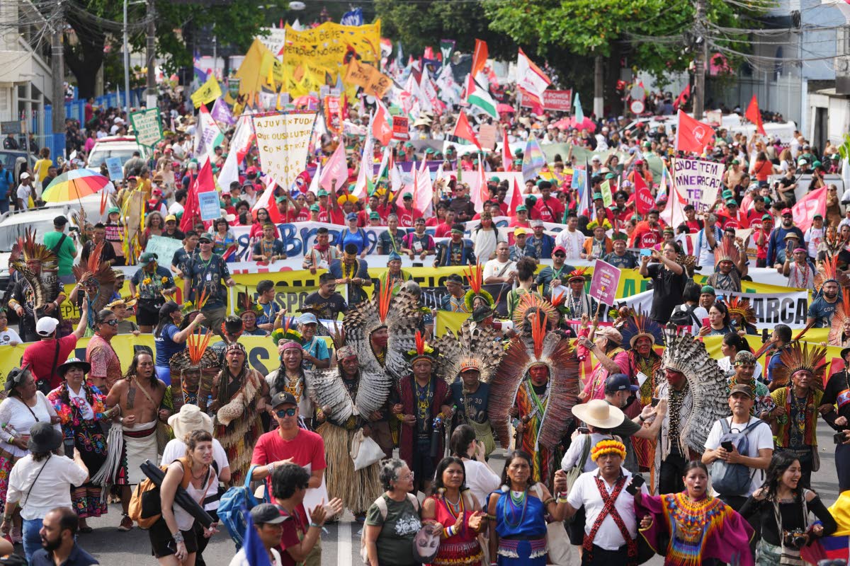 Activists participate in a climate protest during the COP30 UN Climate Summit in Belem, Brazil on November 15. 