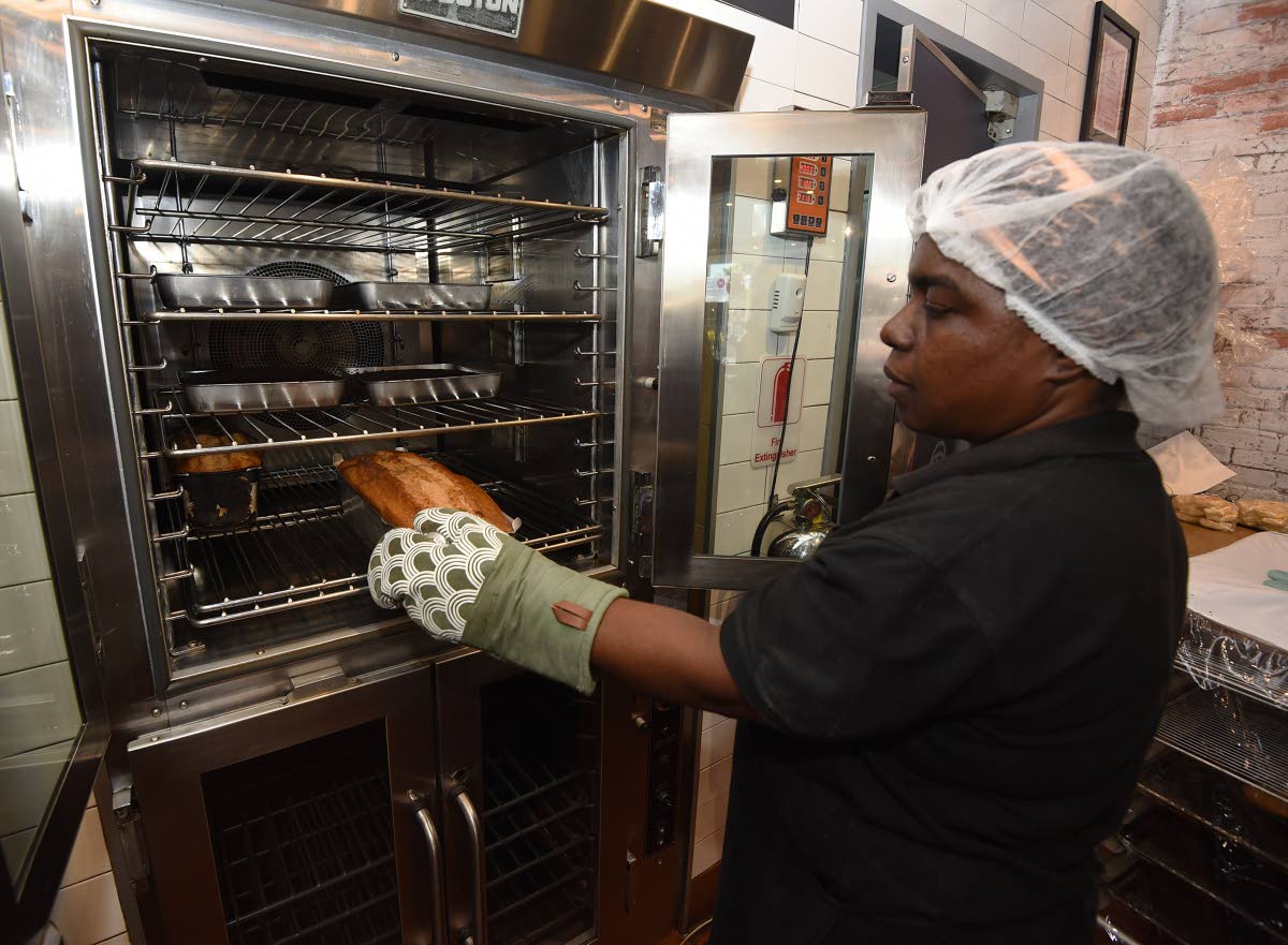 Diane Marriott checks cakes baking in the oven, keeping Susie’s dessert tradition alive.