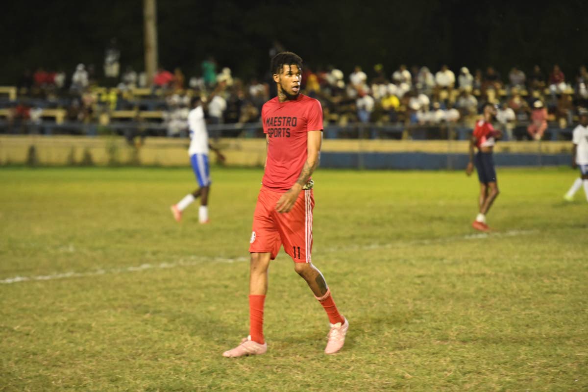 Dancehall artiste Silk Boss out on the field.