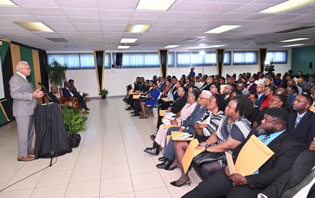 Minister of Justice and Constitutional Affairs, Delroy Chuck, addressing the commissioning ceremony for Justices of the Peace for Kingston, held on December 4, 2025, at Kingston Bookshop, downtown Kingston.