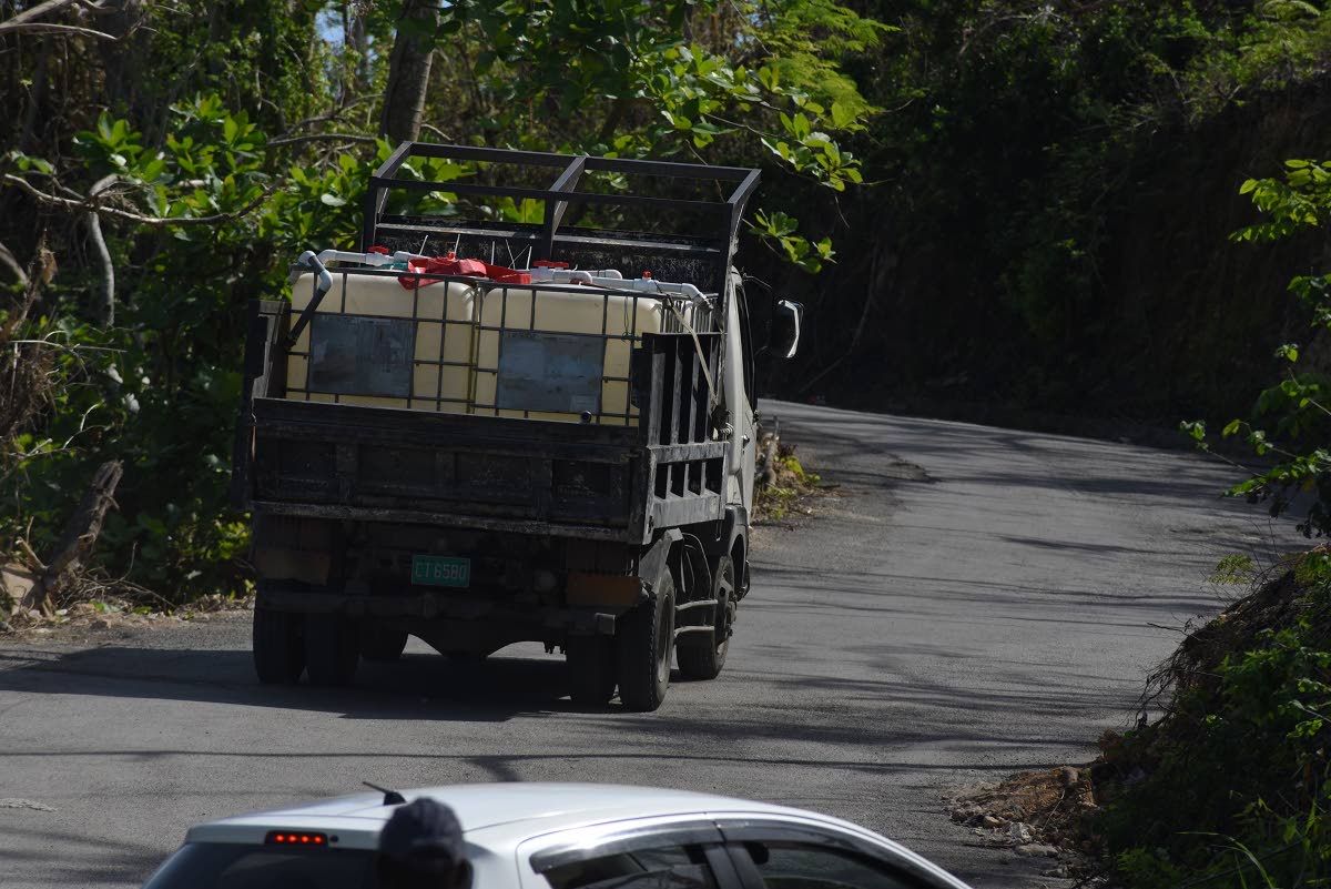 A truck transporting water from the ‘Banana Spring’ in St James.
