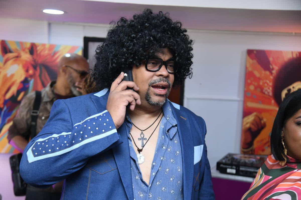 Supreme Ventures Limited  Chairman Gary Peart sports a new look on Mouttet Mile day at Caymanas Park yesterday, sticking to the theme, ‘Back to the 70s’.