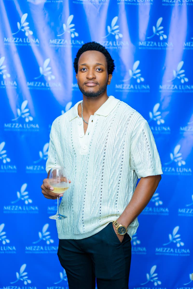 Architect Carlton Simmons, the creative force behind Mezza Luna’s design, enjoys a Don Julio welcome cocktail.