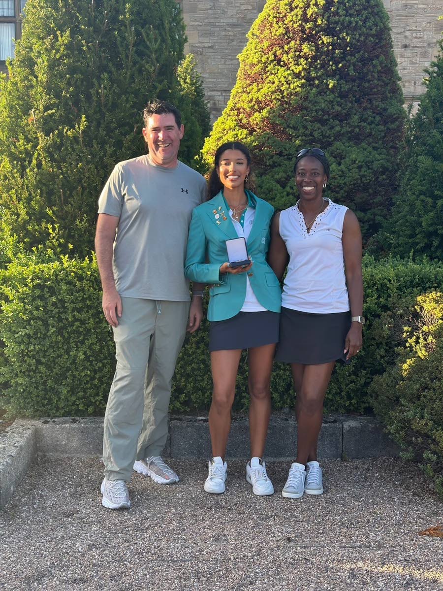 Scanlon (centre) is grateful for the love and support of her parents, Anthony and Taneisha. 