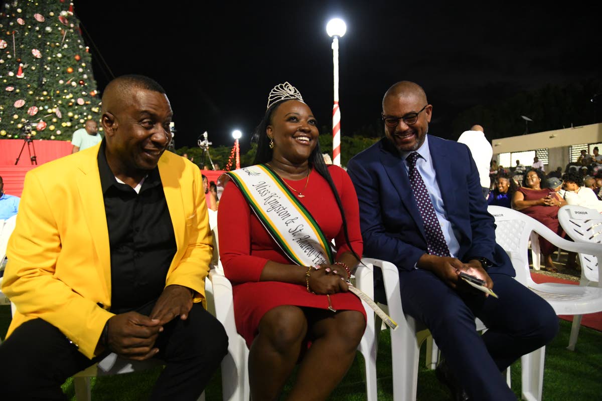 Mayor of Kingston Andrew Swaby; Miss Kingston and St Andrew Festival Queen first runner-up, Johnique Francis; and Mikael Phillips, member of parliament for Manchester North Western representing Opposition Leader Mark Golding, at the annual Christmas tree l
