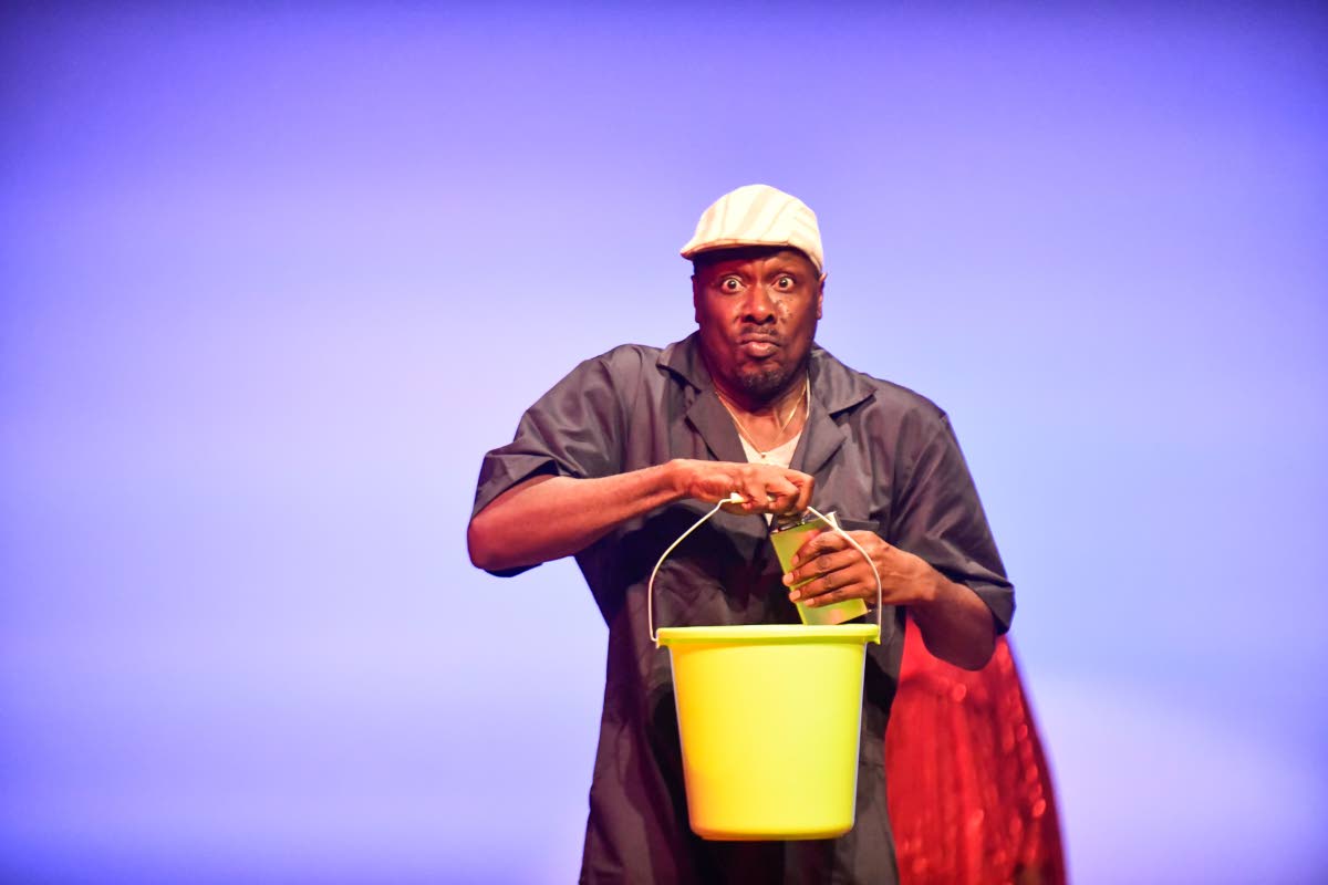 Ray Jarrett, who plays ‘Warren’ in ‘Channel 876’, comes in late with a bucket to put out the fire on the 2024 Boxing Day opening night of the national pantomime.