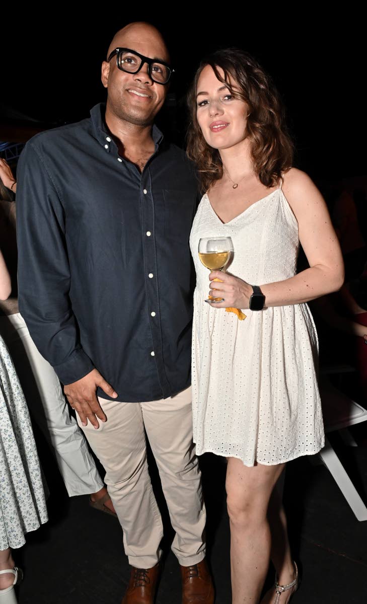 Dane Patterson, attorney-at-law, and his wife, Louise Patterson, personal trainer, enjoy a night out.