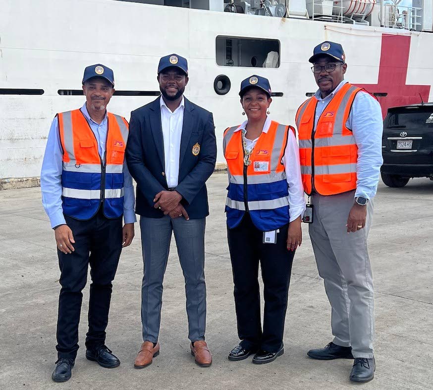 JFS Chief Executive Officer Anna Hamilton is joined on the Montego Bay Cruise Ship Pier by Chris Magnus, COSCO Shipping Line Manager (left), Mayor of Montego Bay Richard Vernon (second left), and Garth Letts, Operations Manager at JFS (right), during the a
