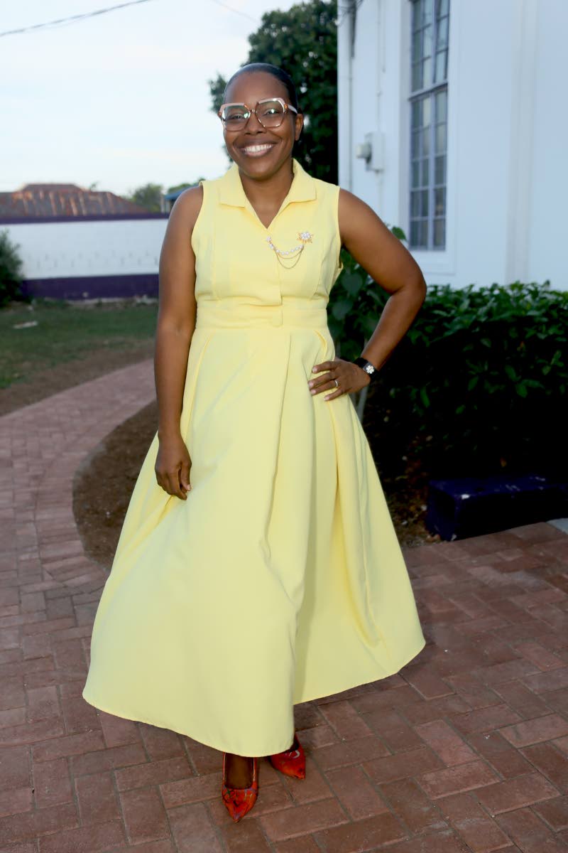 right: Karnette Batchelor Evering, administrator on the KC management team, steps out in a yellow sleeveless collared dress.