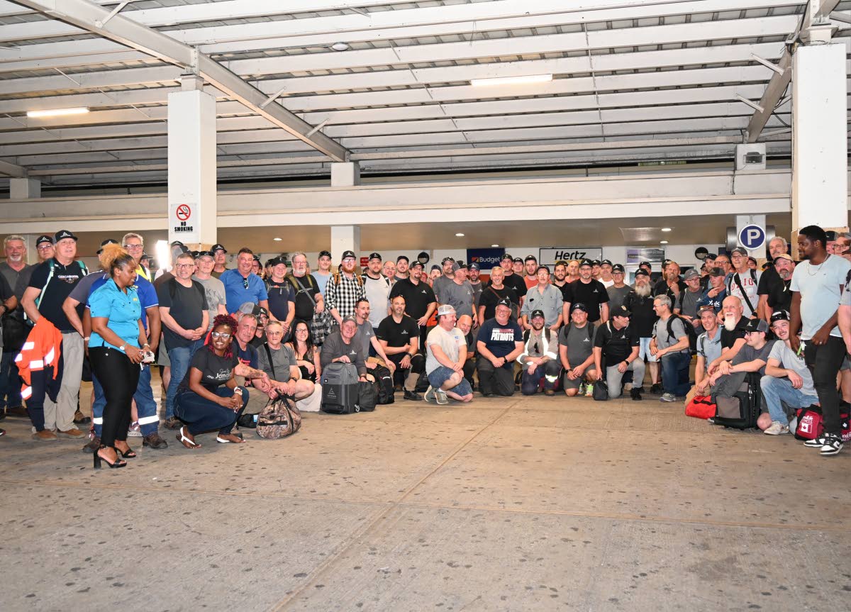 The group of 117 linesmen from Canada that arrived on the Sunrise Airlines for the restoration of light powered by the Jamaica Public Service at the Sangster International Airport on Wednesday.