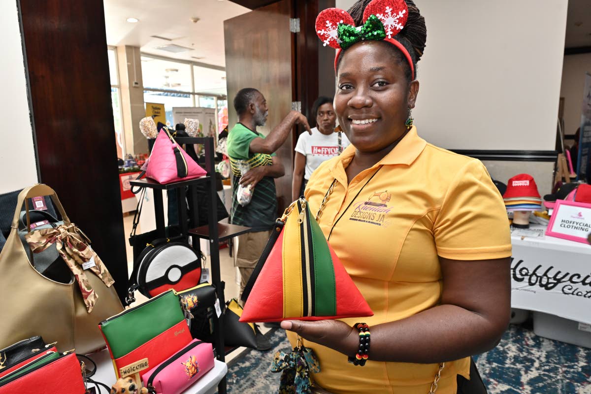 Stacey-Ann Palmer-Clarke of Khentish Designs JA is happy to share her love of handmade leather handbags, totes, and clutches for others to enjoy.
