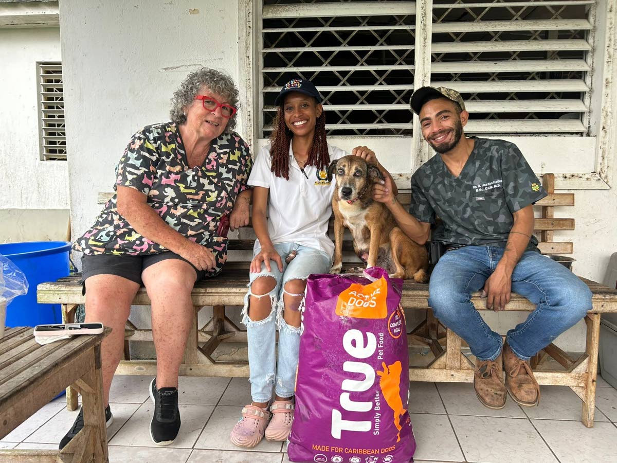 TRUE Free Vet Check at Negril Spay and Neuter Clinic with Dr Jaxson Heffes (right) and from left Debra Lightheart and Dr Heffes’s assistant Diandra Dixon.