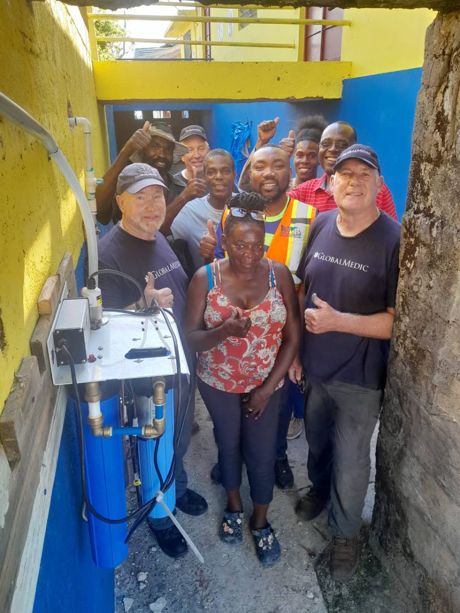 The Global Medic team, along with staff from the Blauwearie Primary and Infant School and representatives from the Westmoreland Health Department.