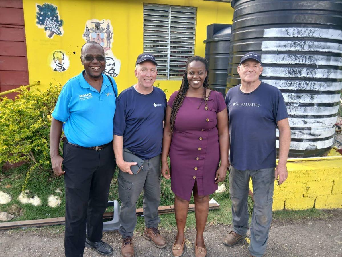 From left: Gerald Miller, Westmoreland health promotion officer; Richard Forward, team lead for Global Medic; Tatesha Murray, principal of the Blauwearie Primary and Infant School; and Morty Bromley, Global Medic team member.