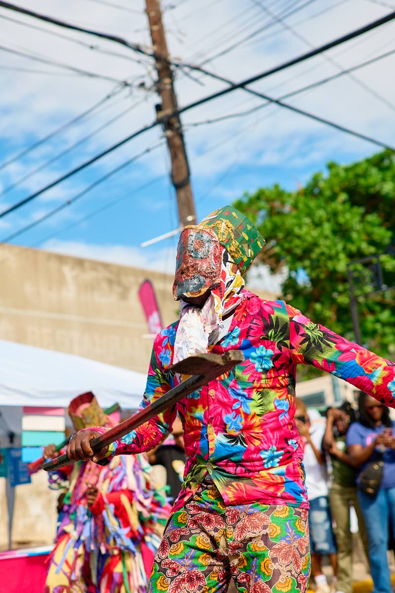 The Warrior is armed with an axe for his performance. 