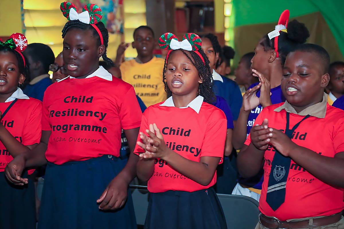 Students from Holy Family Primary light up the room with vibrant performances as part of the Child Resiliency Programme Christmas celebrations.