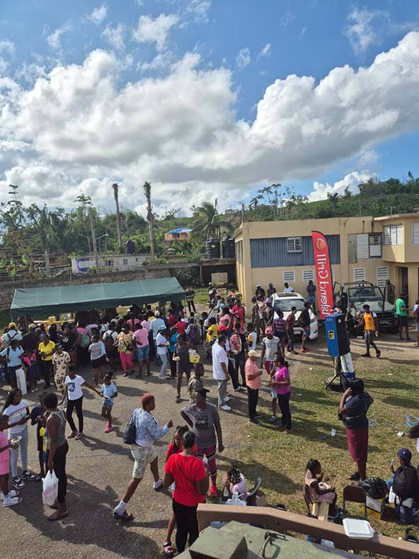 Children and their parents playing and having fun at the Second Battalion Jamaica Regiment’s 2025 Children’s Christmas Fun Day at the Maroon Town Community Centre in St. James on December 30. 